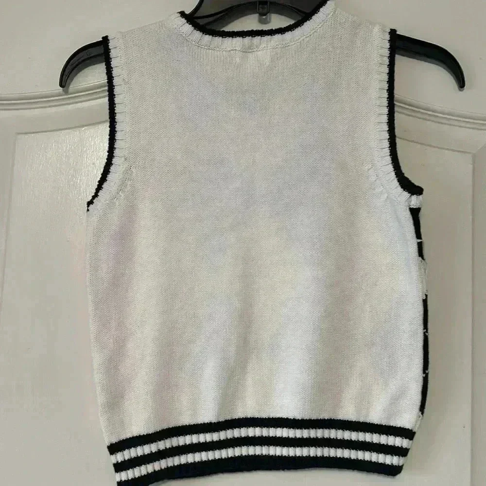 Children’s Place multi color sweater vest.